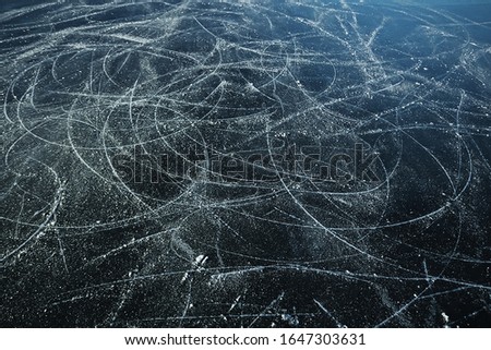 ice traces of skates texture, abstract background, top view aerial photography traces of hockey skates