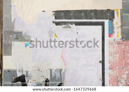 Vintage style old ragged weathered poster wall Royalty-Free Stock Photo #1647329668