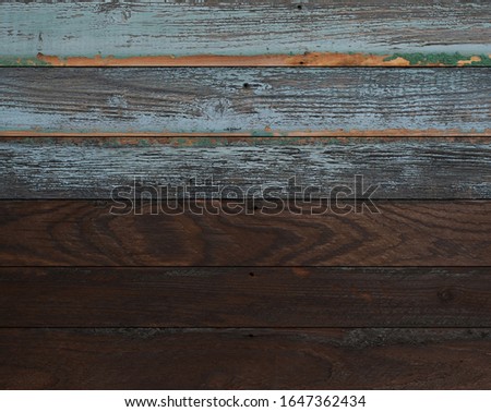 Brown and blue wooden boards texture for background. Dark weathered wood.