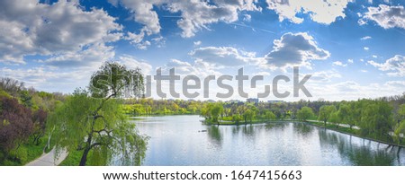 Panoramic view over Tineretului Park and Lake in Bucharest during a beautiful summer day Royalty-Free Stock Photo #1647415663