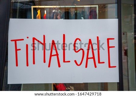 shop for elegant women's fashion with a sign on the shop window and the text: FINAL SALE