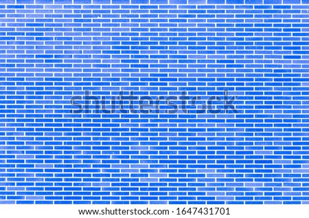 real wall made of solid blue bricks, in horizontal plane, for background