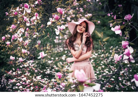 spring portrait of a girl in flowers
