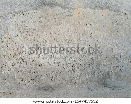 The​ pattern​ of surface​ wall​ concrete​ damaged​ by​ rust​ for​ background. Rust​ wall​ for​ paper​ background​