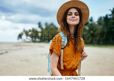 Cheerful woman travel nature tropics island exotic destination