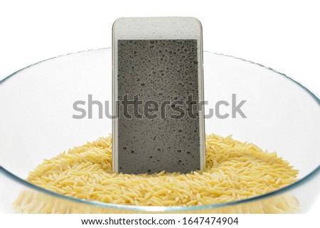 Lifehacks, digging your wet mobile phone in rice will fix it.     