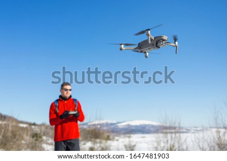 A Young Male Operating a Drone