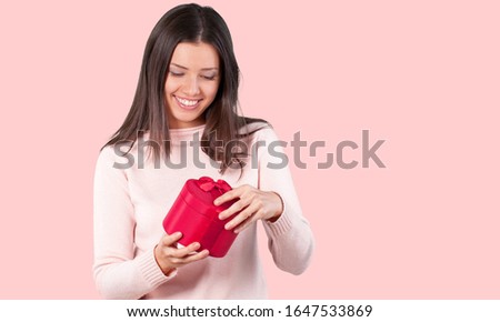 Shocked young happy woman girl with gift box