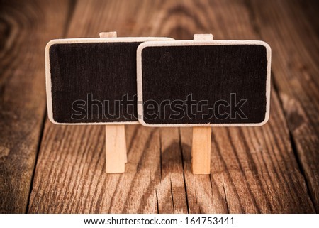 small chalkboard on wooden background