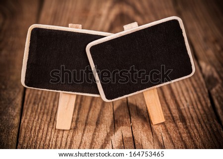 small chalkboard on wooden background