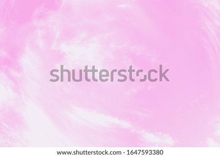 Pink sky background with soft delicate white clouds. Copy space. Romantic background