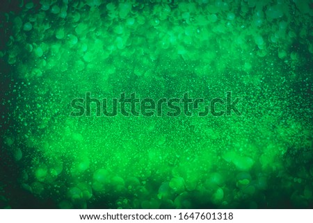 Abstract Green Glitter bokeh Background for St Patrick's day Holiday Patrick's festive background