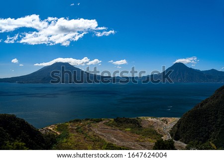 View of Atitlan Lake in Solo, Guatemala  with the Atitlan, Toliman, and San Pedro Volcanoes in the background (2020). 