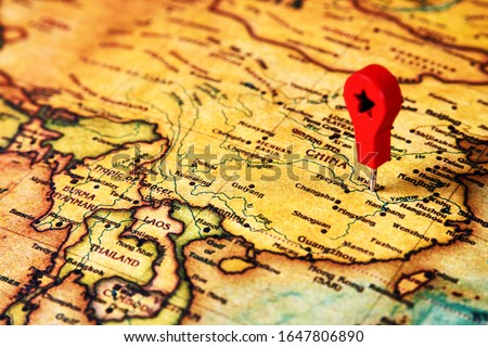 Wuhan marked on map with map pin. China map with map marker on Wuhan city, close-up. Coronavirus epidemic in Wuhan. 2019-nCov - virus infection from Wuhan Royalty-Free Stock Photo #1647806890