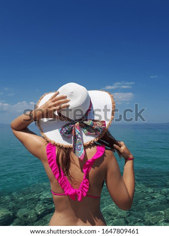 Girl looking to the sea