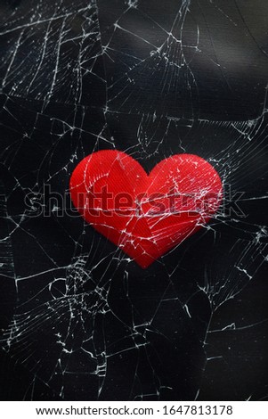broken glass red heart. The concept of treason, abandonment. For design
