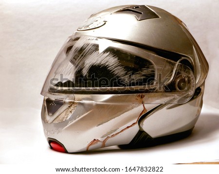 crash helmet after a motorcycle accident Royalty-Free Stock Photo #1647832822