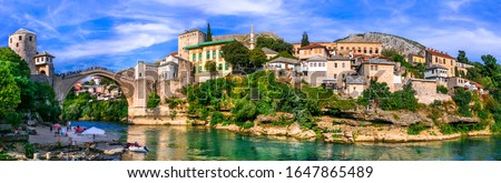 Beautiful iconic old town Mostar with famous bridge in Bosnia and Herzegovina, popular tourist destination Royalty-Free Stock Photo #1647865489