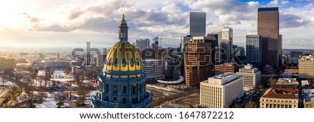 Colorado State Capitol Building & the City of Denver Colorado at Sunset. Rocky Mountains on the Horizon Royalty-Free Stock Photo #1647872212