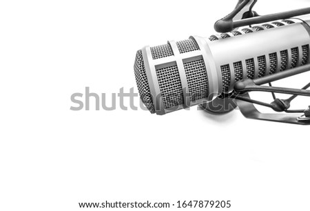 for radio stations and podcasts: background with a professional microphone