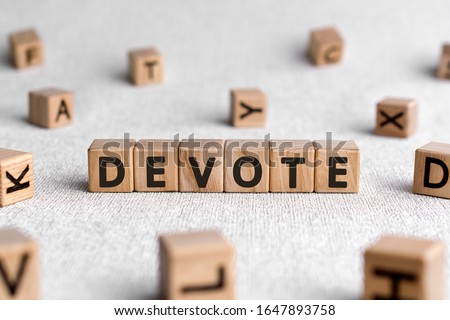 Devote - words from wooden blocks with letters, to give all of something devote concept, white background Royalty-Free Stock Photo #1647893758