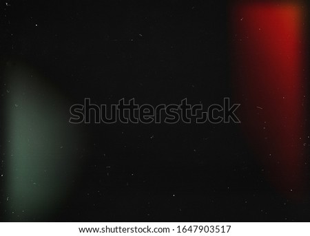 Abstract light effect on black background. Grain texture Royalty-Free Stock Photo #1647903517