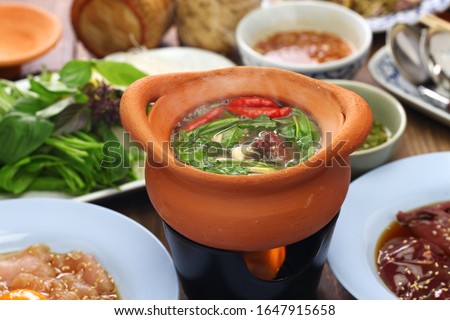 chim chum, Thai Isan traditional hot pot Royalty-Free Stock Photo #1647915658