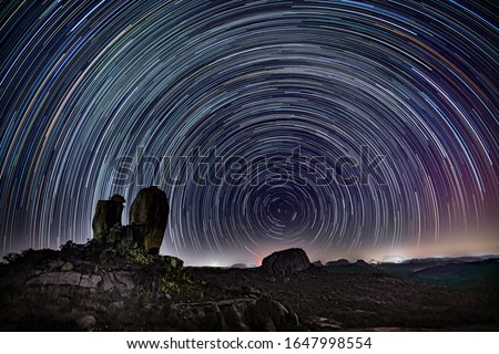 A star trail photo taken at a remote location with Polaris as the center star Royalty-Free Stock Photo #1647998554
