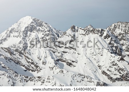 Austrian Mountains in the Alps of Tyrol. Alpine Winter landscape and mountain panorama in Europe. Glacier Stubaier Gletscher Skiing area near Innsbruck. Fantastic sunlight