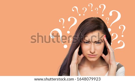 Question sign with a beautiful alarmed woman on pastel background