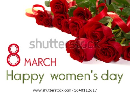 Womens day concept. freshly cutted red roses on white background with sample tex