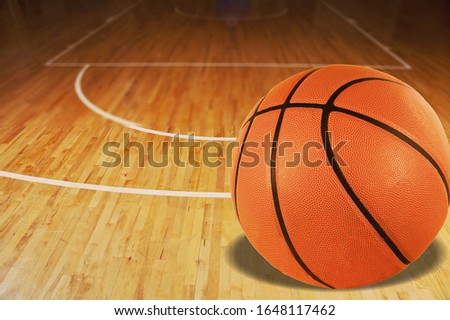 Classic orange basketball ball on the floor