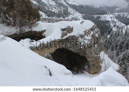 Snow covered wind cave during winter