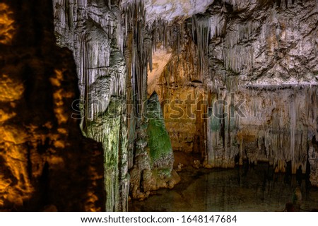 Neptune's Grotto, a stalactite cave near the town of Alghero on the island of Sardinia, Italy. Focus on the background.