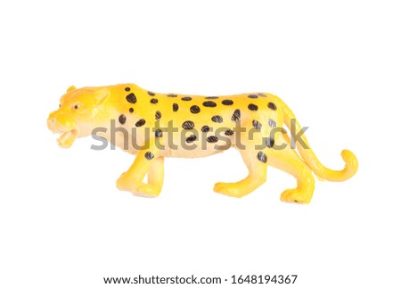 Plastic leopard doll isolated on white background