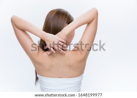 Back of slim young woman on white background. Royalty-Free Stock Photo #1648199977