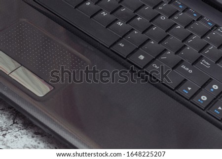 black laptop keyboard with english letters