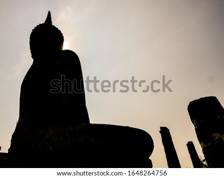 silhouette of buddha at sunset, beautiful photo digital picture