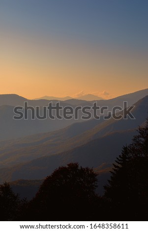 Mountains Landscape. Beautiful Mountain peaks at sunset.
