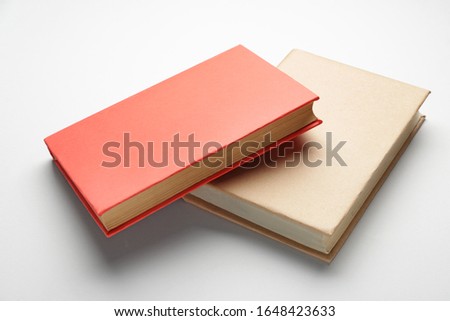Two books on light background Royalty-Free Stock Photo #1648423633