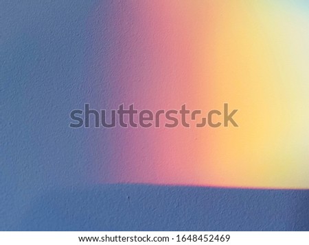 Abstract colorful reflection shadow on wall background