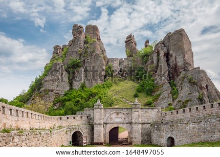 View of the Belogradchik Fortress. The rock formations create a natural fortress with a high defensive potential. Ancient fortress located on the north slopes of the Balkan Mountains, Bulgaria. Royalty-Free Stock Photo #1648497055