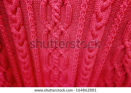 Pink knitted fabric texture background