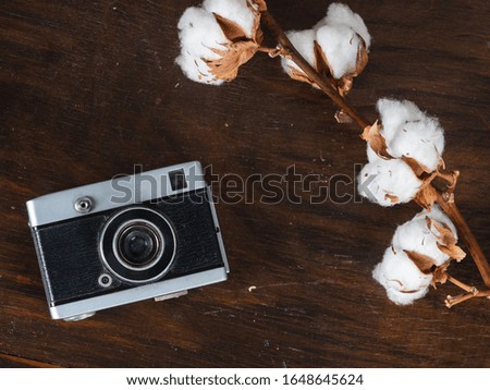 Retro photo camera on a table