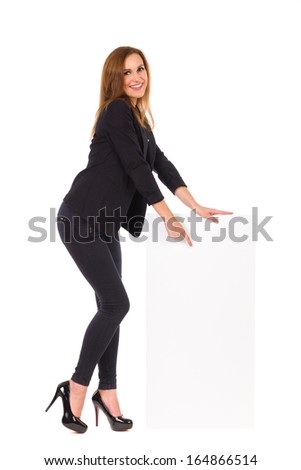Elegance woman pointing at blank card. Full length studio shot isolated on white.
