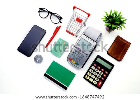 Online shopping Electronic payments. Pay the bill by card concept on white background, Flat lay finance bank technology cashless concept
