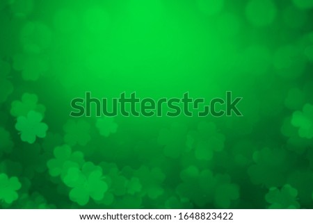 ST Patrick's day background green clover leaf bokeh lights defocused for ST Patrick's day celebration design background