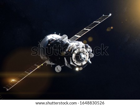 Soyuz MS-21 manned spacecraft in orbit around the Earth. Solar system. Elements of this image furnished by NASA.