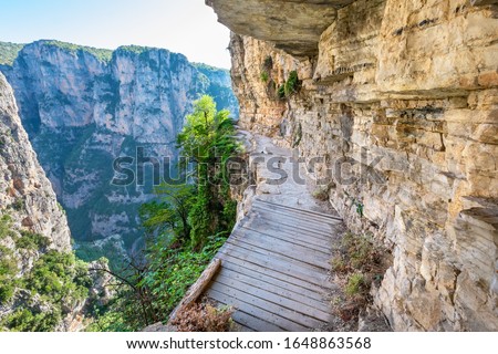 Cliff hanging trail near monastery of Agia Paraskevi. Monodendri, Epirus, Greece Royalty-Free Stock Photo #1648863568