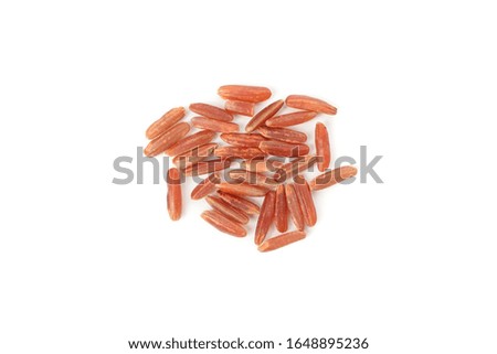 Red rice isolated on white background, close up